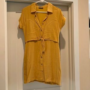 Dress with front buttons and tie